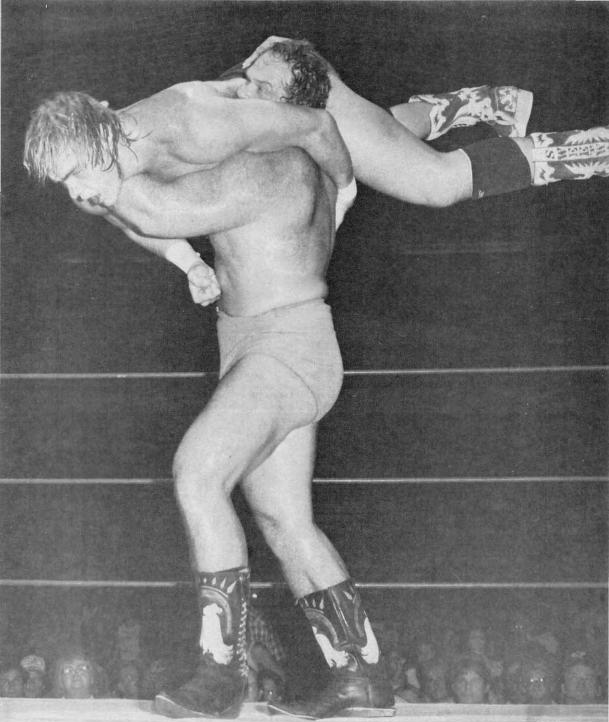 Ron Bass (bottom) prepares to bodyslam Barry Windham (top), circa 1983