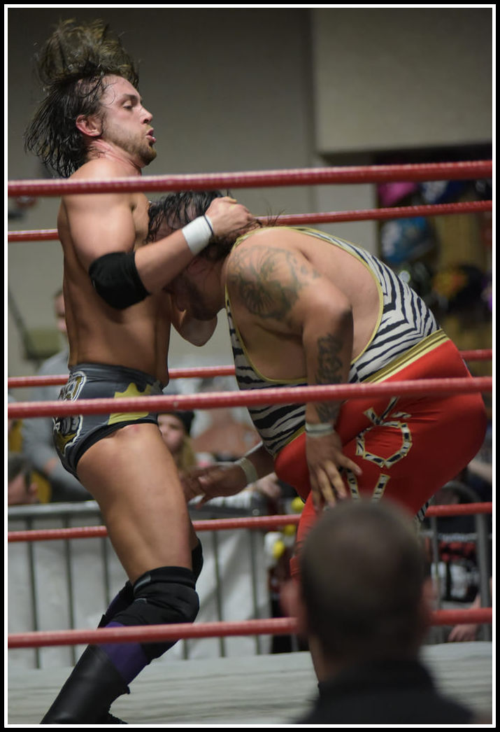 TK O'Ryan and Kongo lock up at a 2016 TRP wrestling event