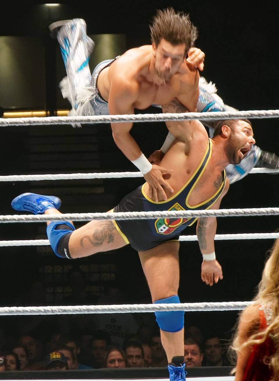 Santino Marella (right) hip tosses Fandango at a WWE house show in Vorst, Belgium on November 8, 2013.